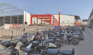 让电动自行车“有地停”